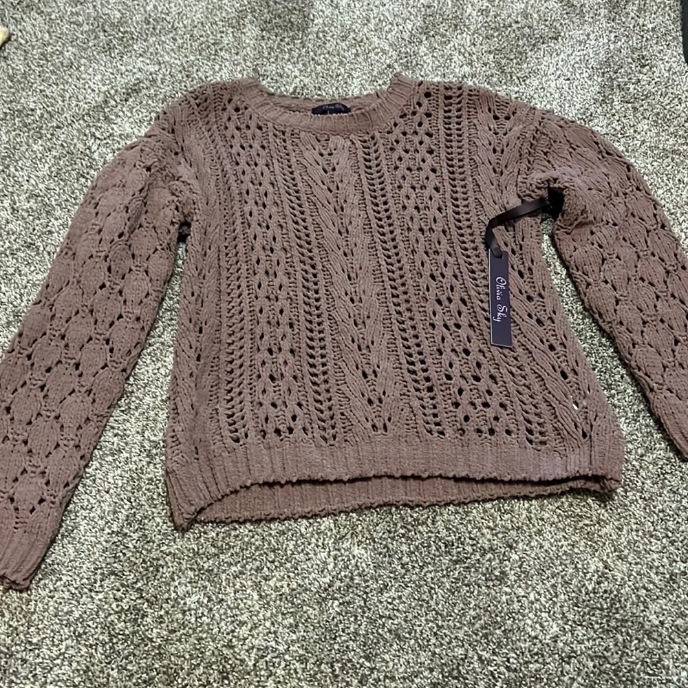 Loose knit sweater. Never worn.